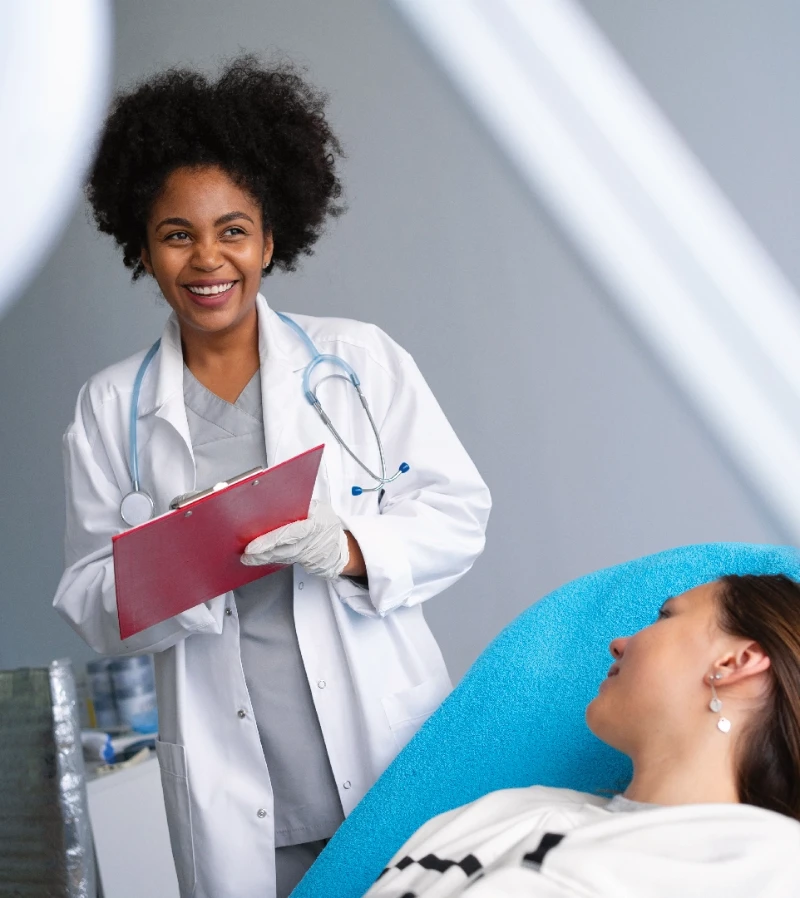 A nurse attending to a patient